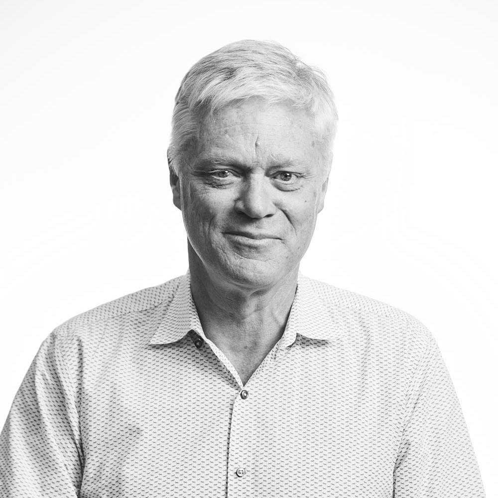 Black & white portrait photo of Mark Binns, Hammerforce Board Chair