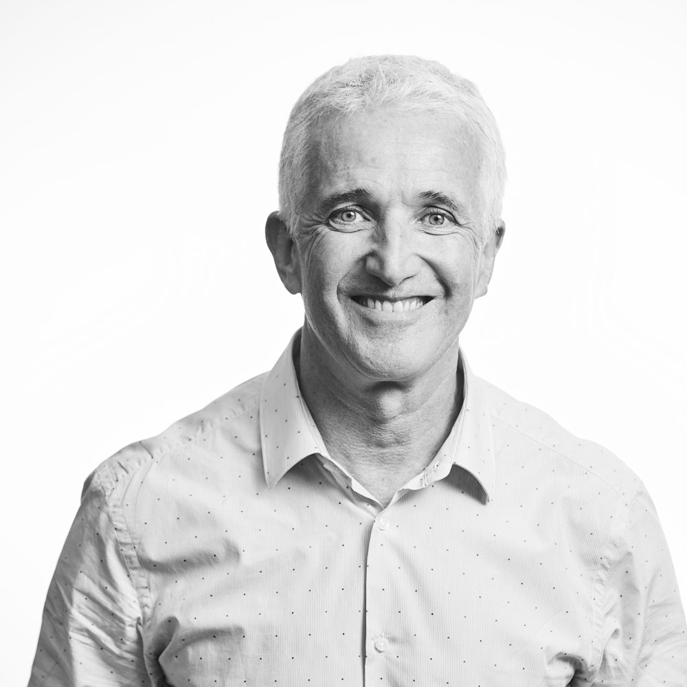 Black & white portrait photo of Rob Fyfe, Hammerforce Board Non-Executive Director