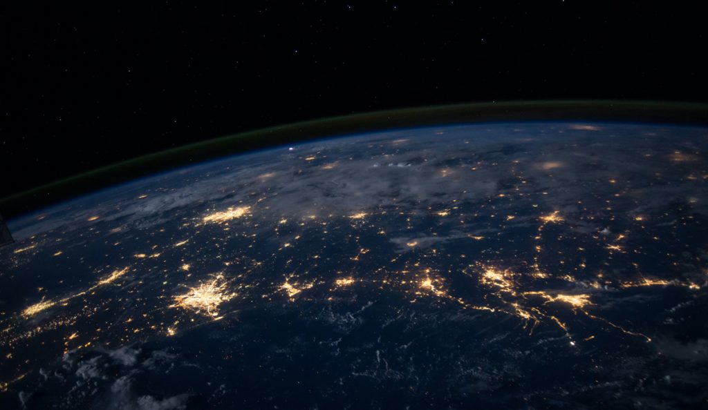 Earth lit up at night time, as seen from space