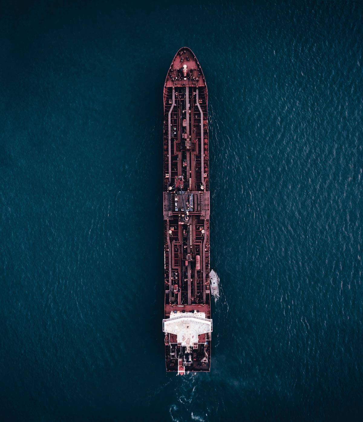 Aerial photo of a tanker moving through the ocean